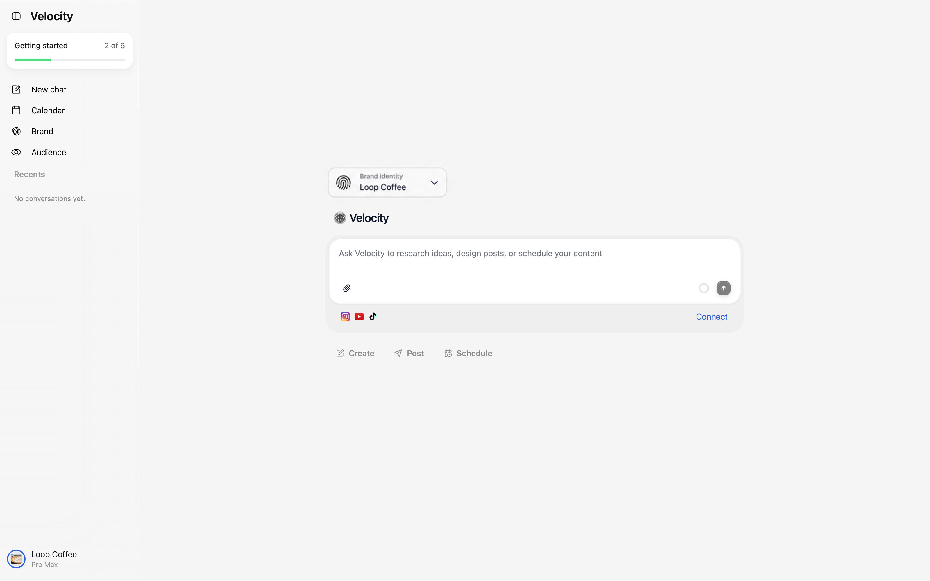 Velocity workspace showing Loop Coffee selected in the Brand identity control before creating social content.