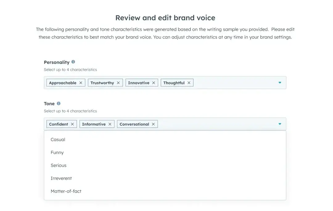 HubSpot interface showing editable brand personality and tone characteristics for AI content across marketing channels.